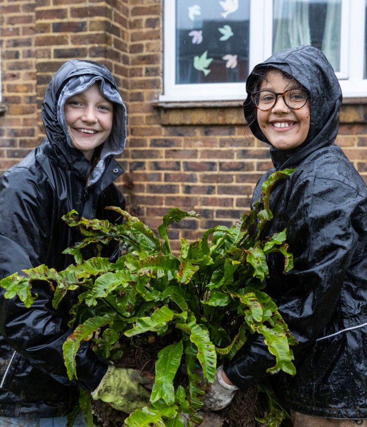  Prep School pupils helping out in the local community by gardening for Make A Difference Day 