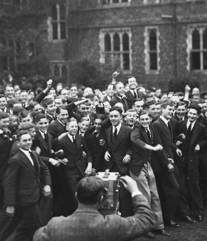  Archive Photo of photographer talking a picture of boys in their uniform in the Quad 