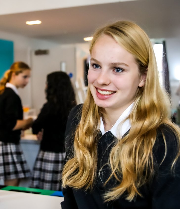  New House boarder enjoying activities in the common room after-school 