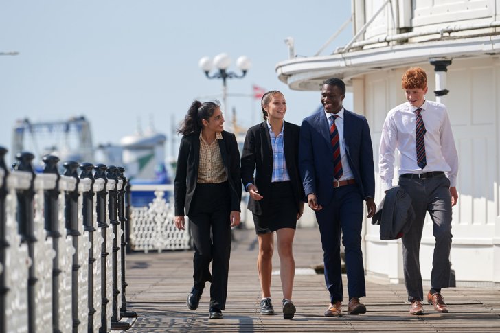  Sixth Form pupils enjoying walking along the Brighton Pier together 