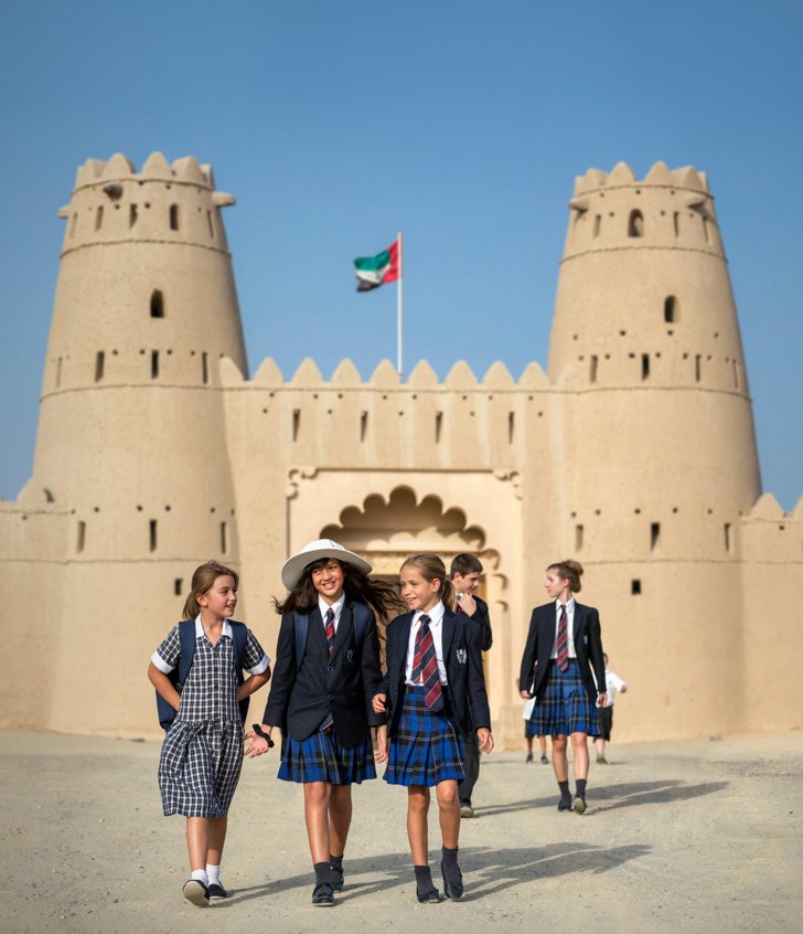  Pupils walking outside the Al Jahili Fort in Al Ain 