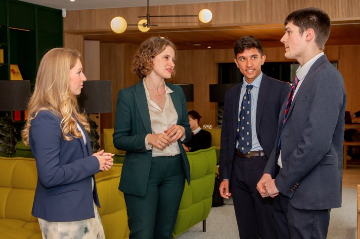  Sixth Form Pupils talking to Head of Sixth Form in the Sixth Form Club 