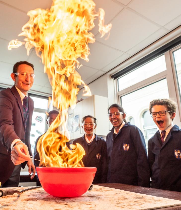  Teacher amazing Prep School pupils by creating a huge flame through a chemical reaction in a Science lesson 