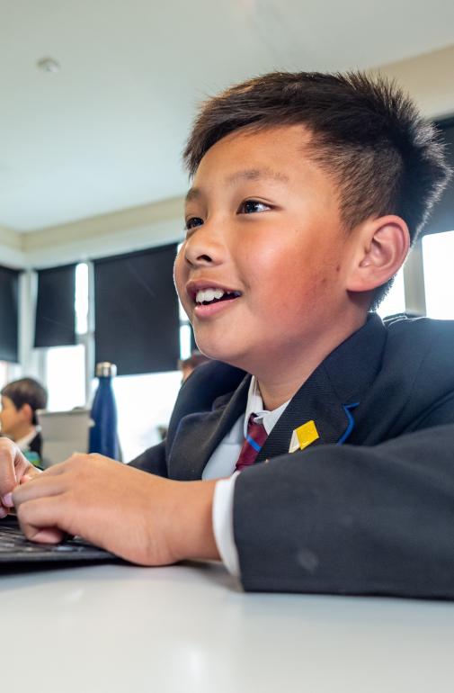  Prep School pupils working on Surfaces during a lesson in the classroom 