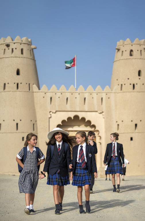  Pupils walking outside the Al Jahili Fort in Al Ain 