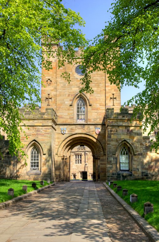  View of the Castle Gatehouse at Durham University amongst the trees 