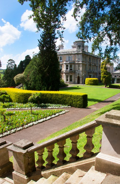  University of Exeter Reed Hall across the grass in the sun 