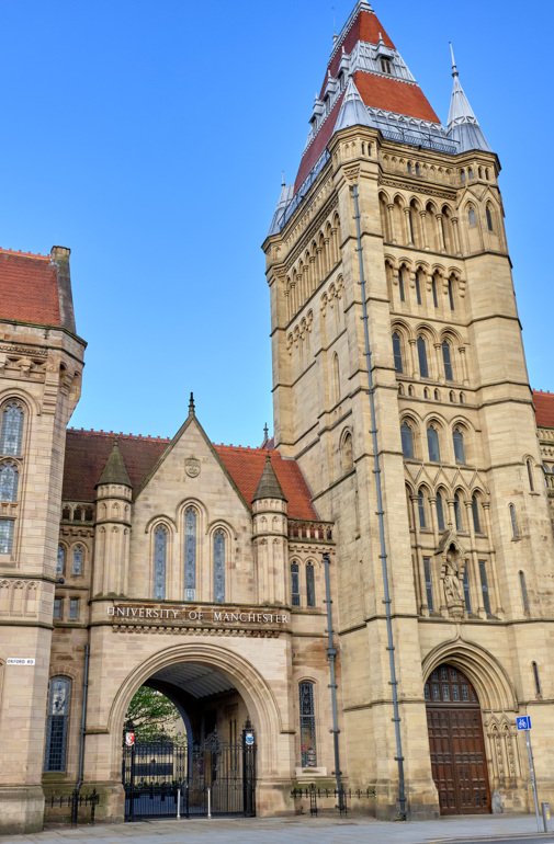  University of Manchester Tower with blue sky 